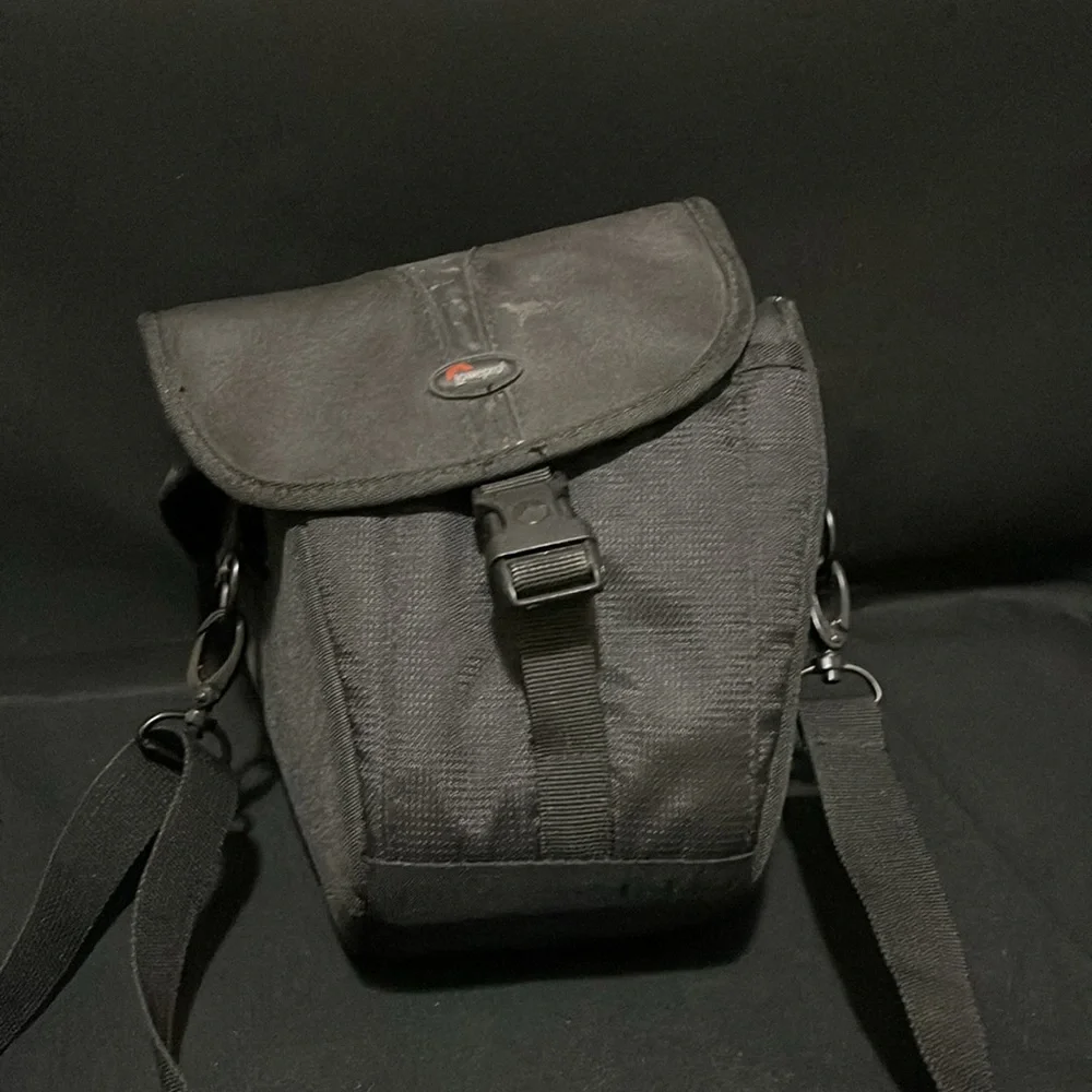 Canon EOS Revel G 35mm film camera with case.